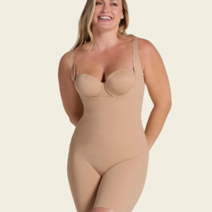 Woman wearing DuraFit open-bust body shaper with firm compression and ruched butt-lift design